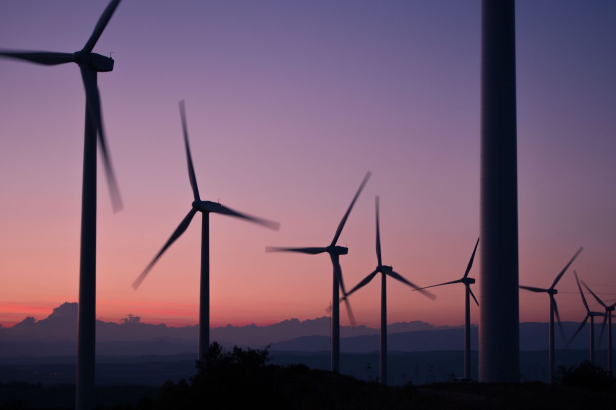 Windmills in the sunset by Anna Jimenez on Unsplash